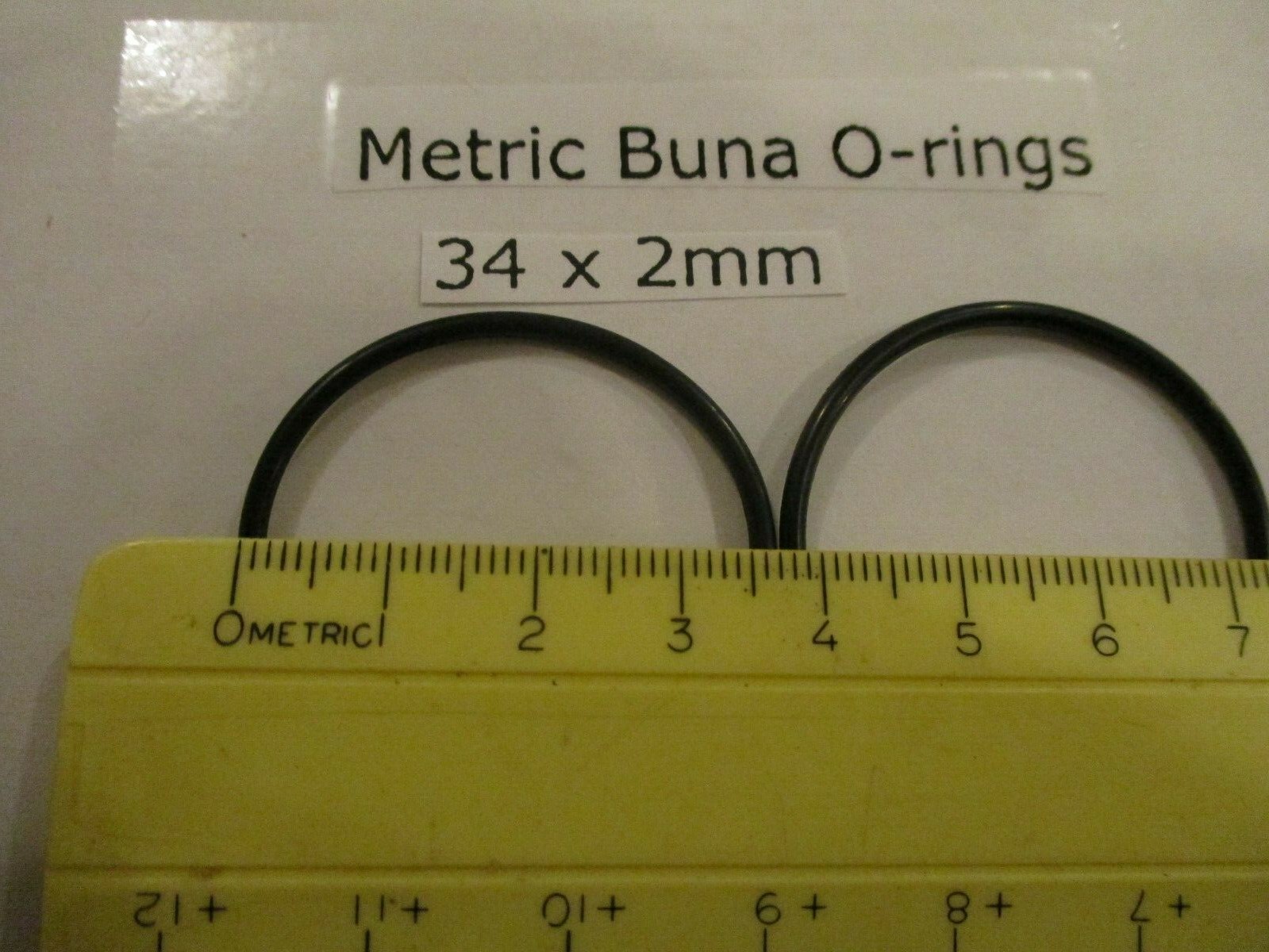 34mm ID x 38mm OD x 2mm thick O-ring. Buna-70. Quan 2.