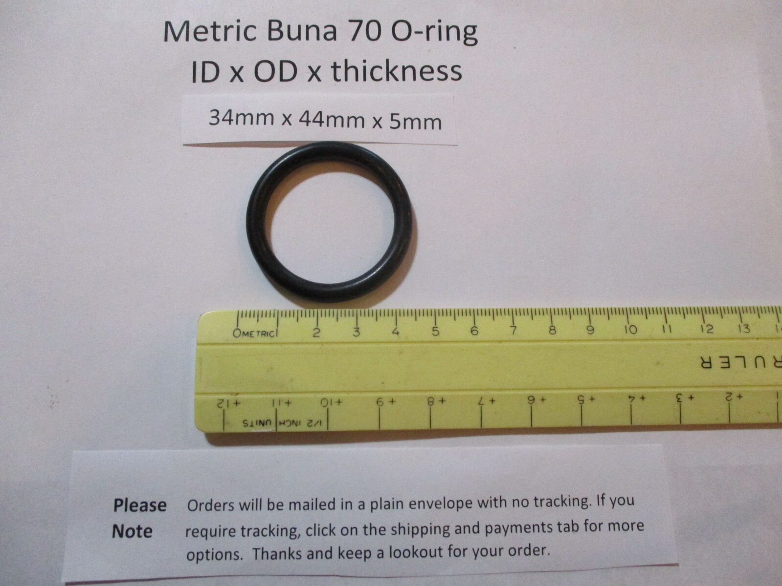 34mm ID x 44mm OD x 5mm thick O-ring. Buna-70. Quan 1.