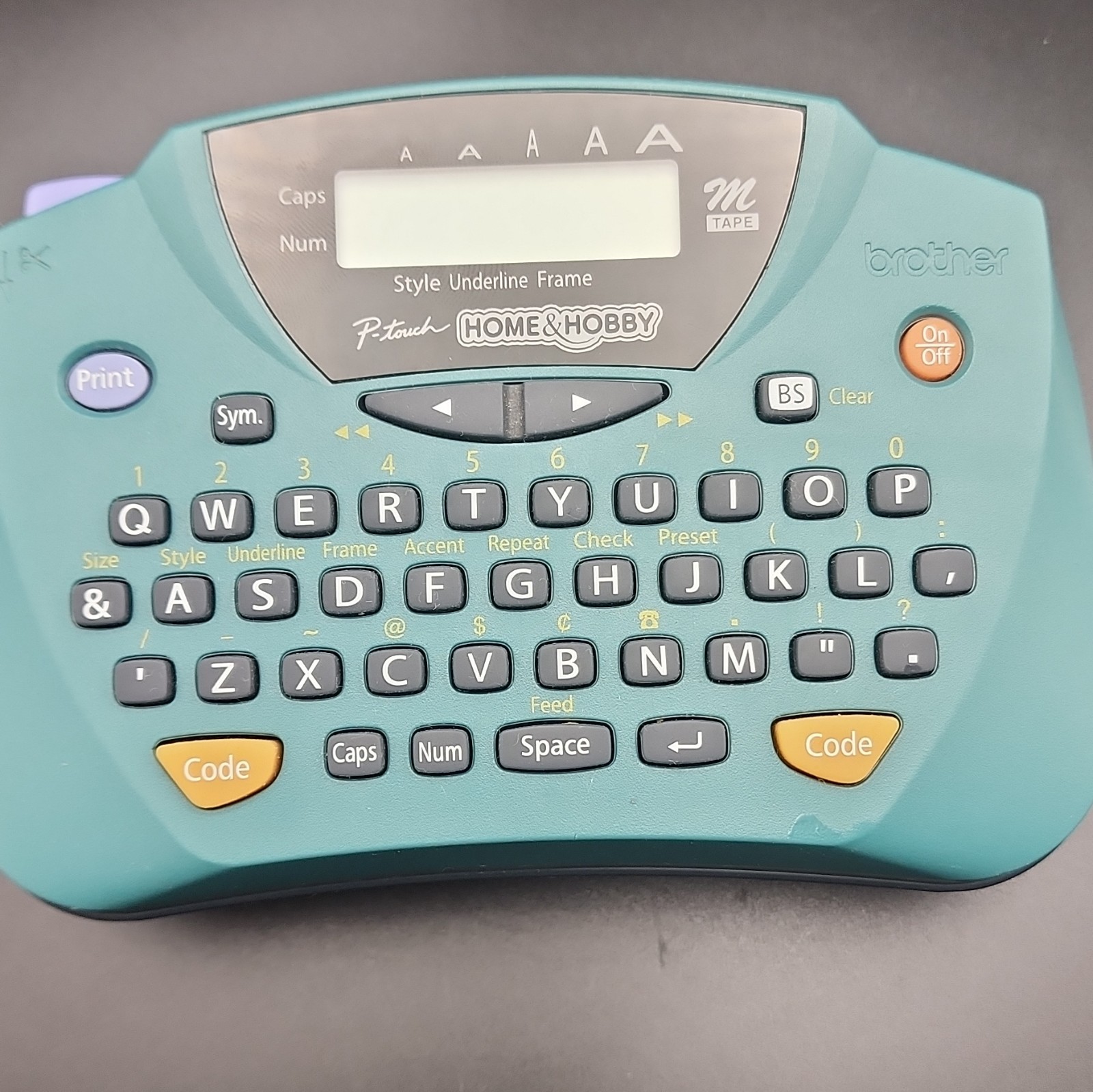 Brother PT-65 P-Touch Home & Hobby Label Maker.