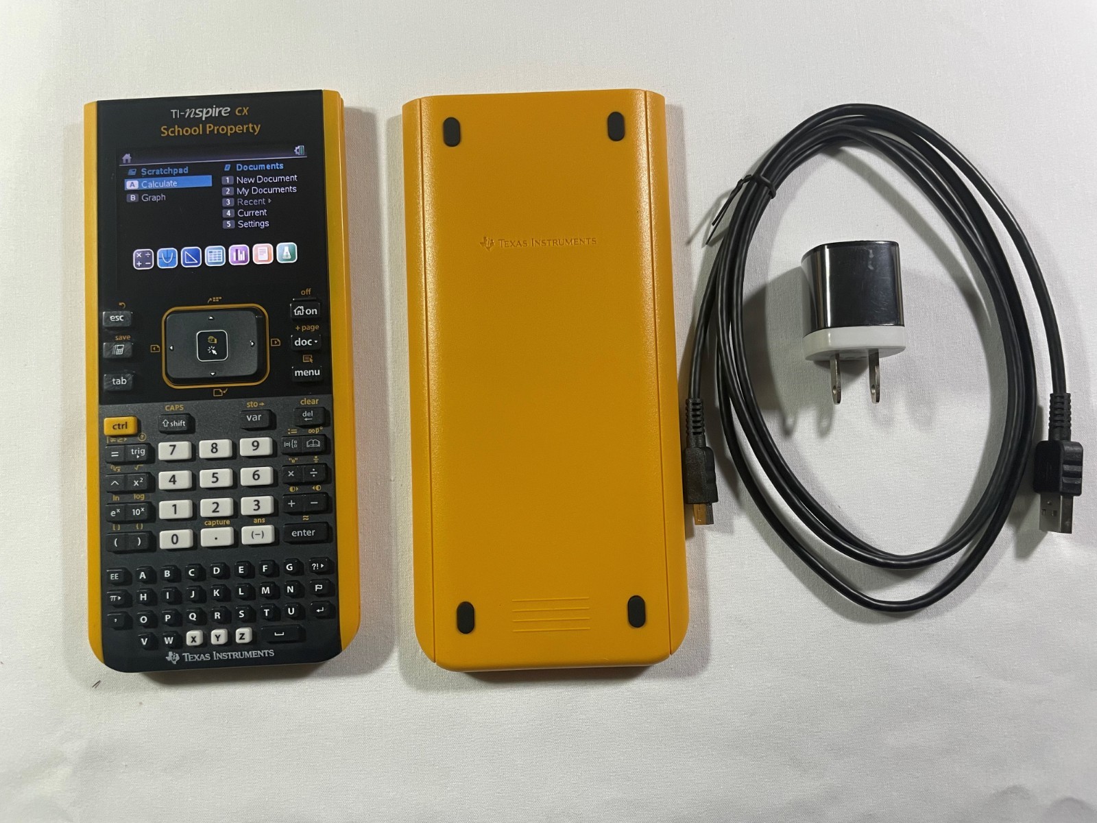 TI Nspire CX Color-Display Graphing Calculator with School Property Markings.