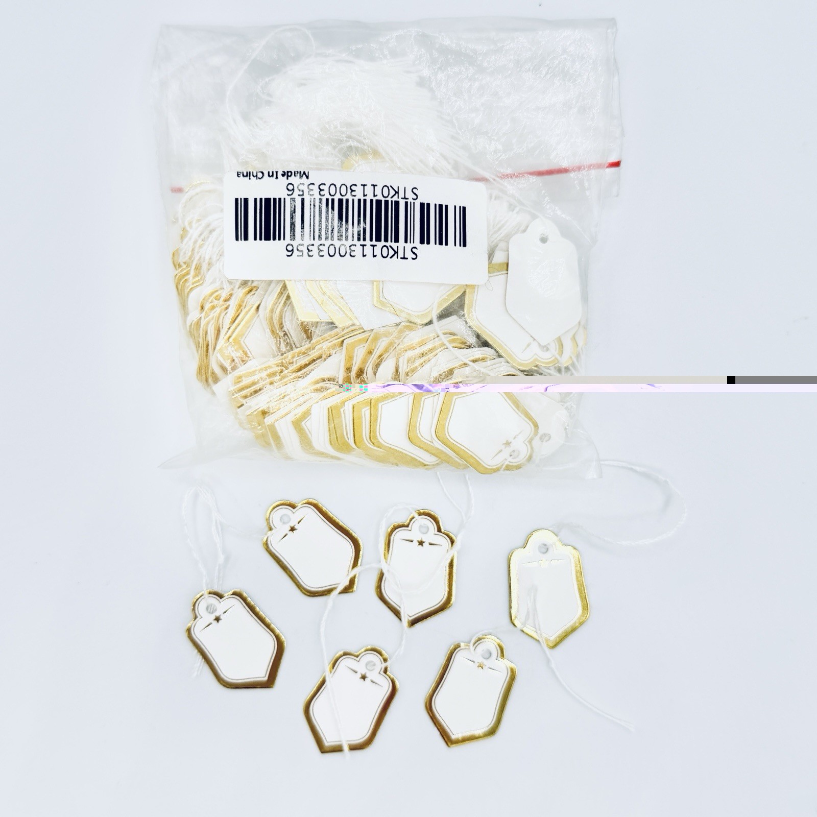 White With Gold Trim Marking Hanging Tags