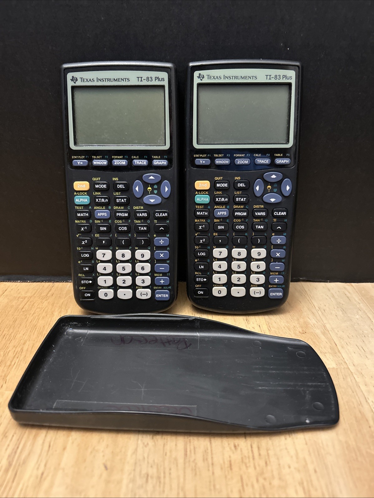 (For Parts) Lot of 2 – Texas Instruments – TI 83 & Plus Calculators
