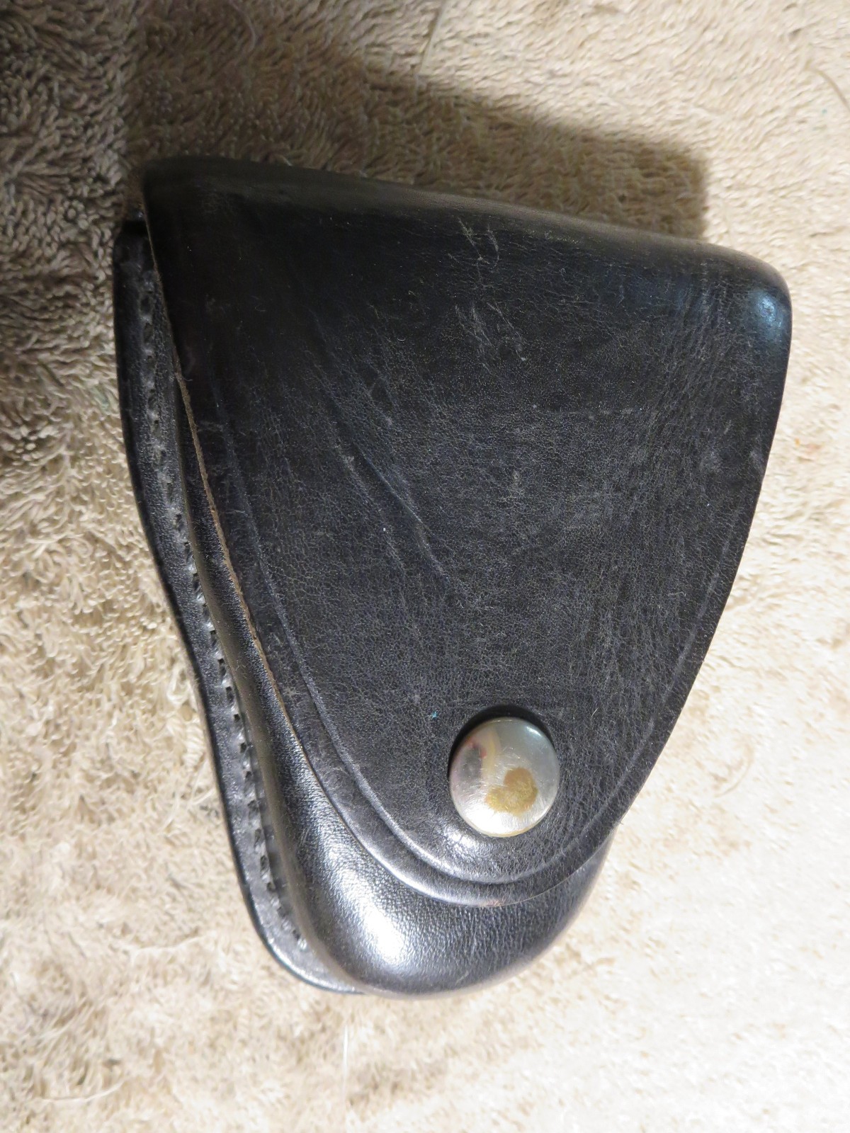 4 handcuff cases: 3 brand names in excellent cond. 1 older, modified, no name.