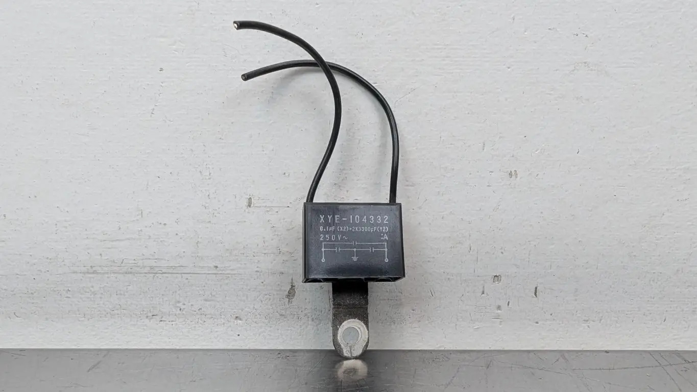 Okaya XYE-104332 Noise Suppression Capacitor 250VAC 0.1µF X2 2X3300pF Y2