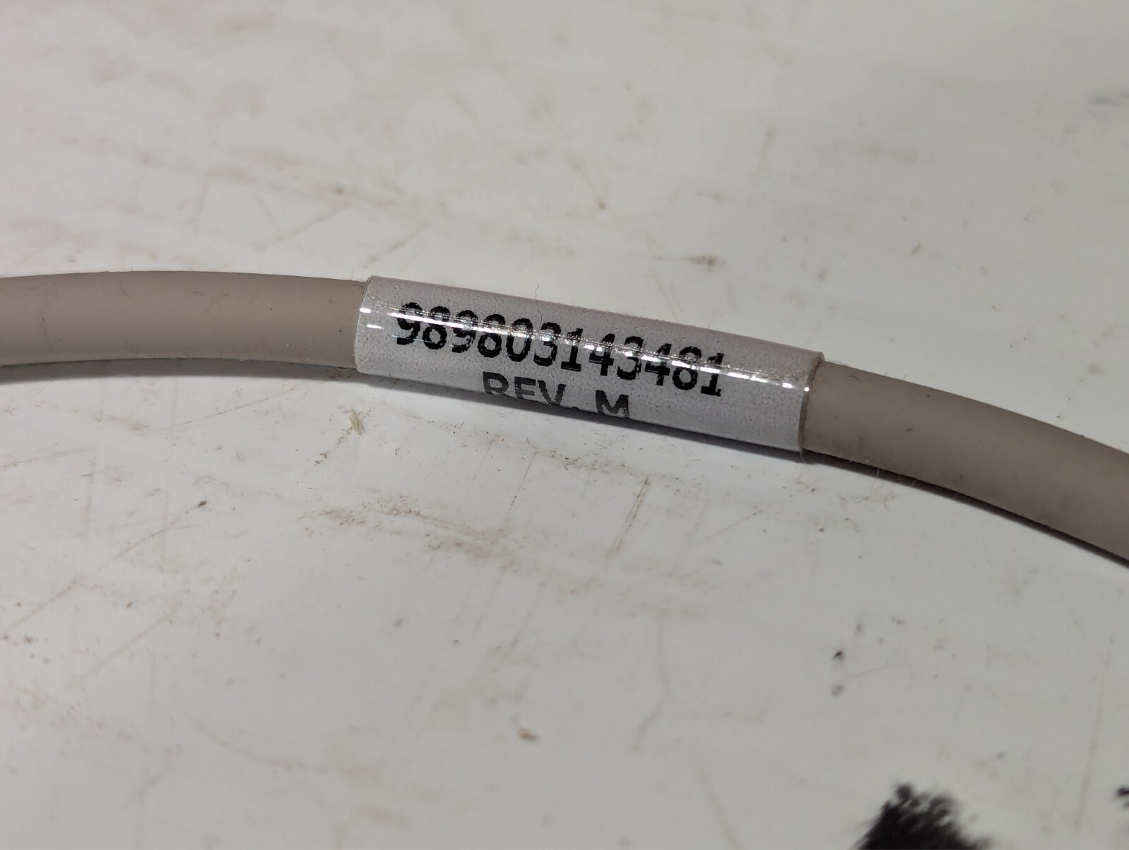 Philips 989803143481 PWD tether cable in original packaging as shown