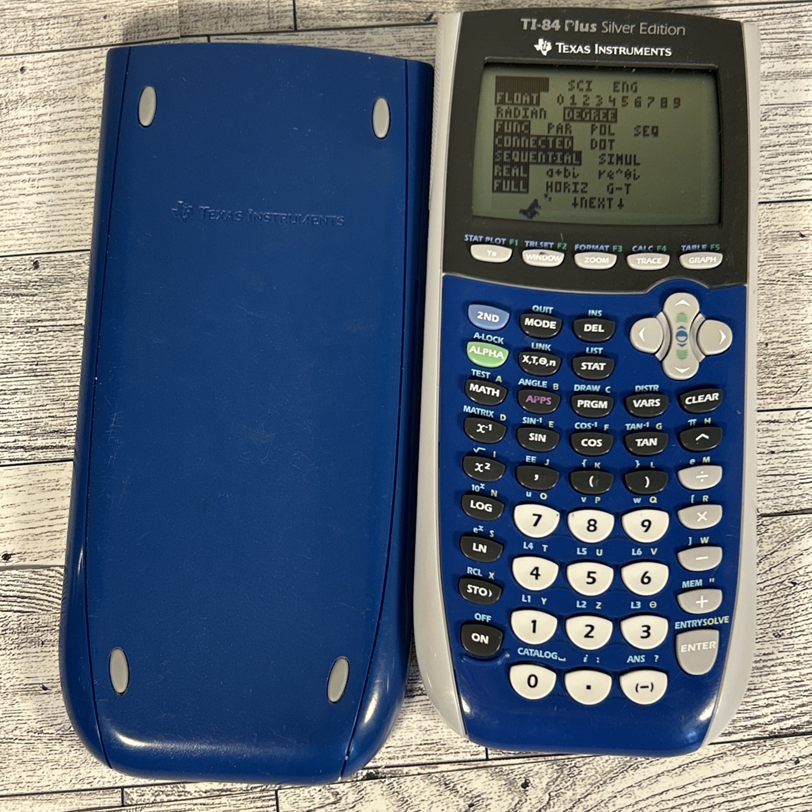 Texas Instruments TI-84 Plus Silver Edition Graphing Programmable, Blue Cover