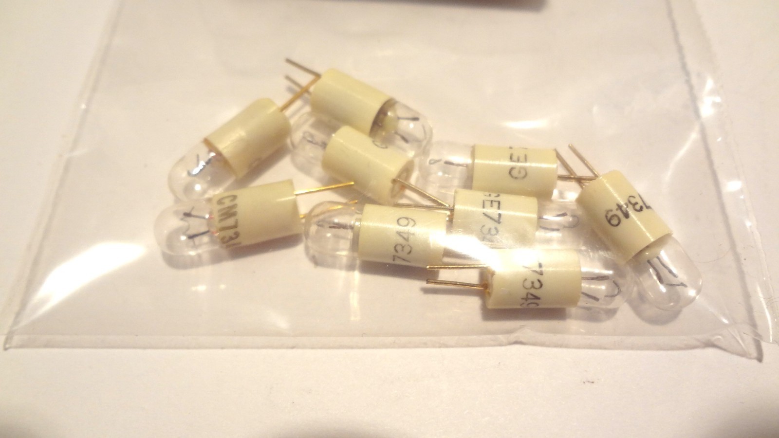 GE LAMPS # 7349 BOX OF (9EA) 6.3VOLT, 1. WATT MINATURE PIN BASE**NEW**