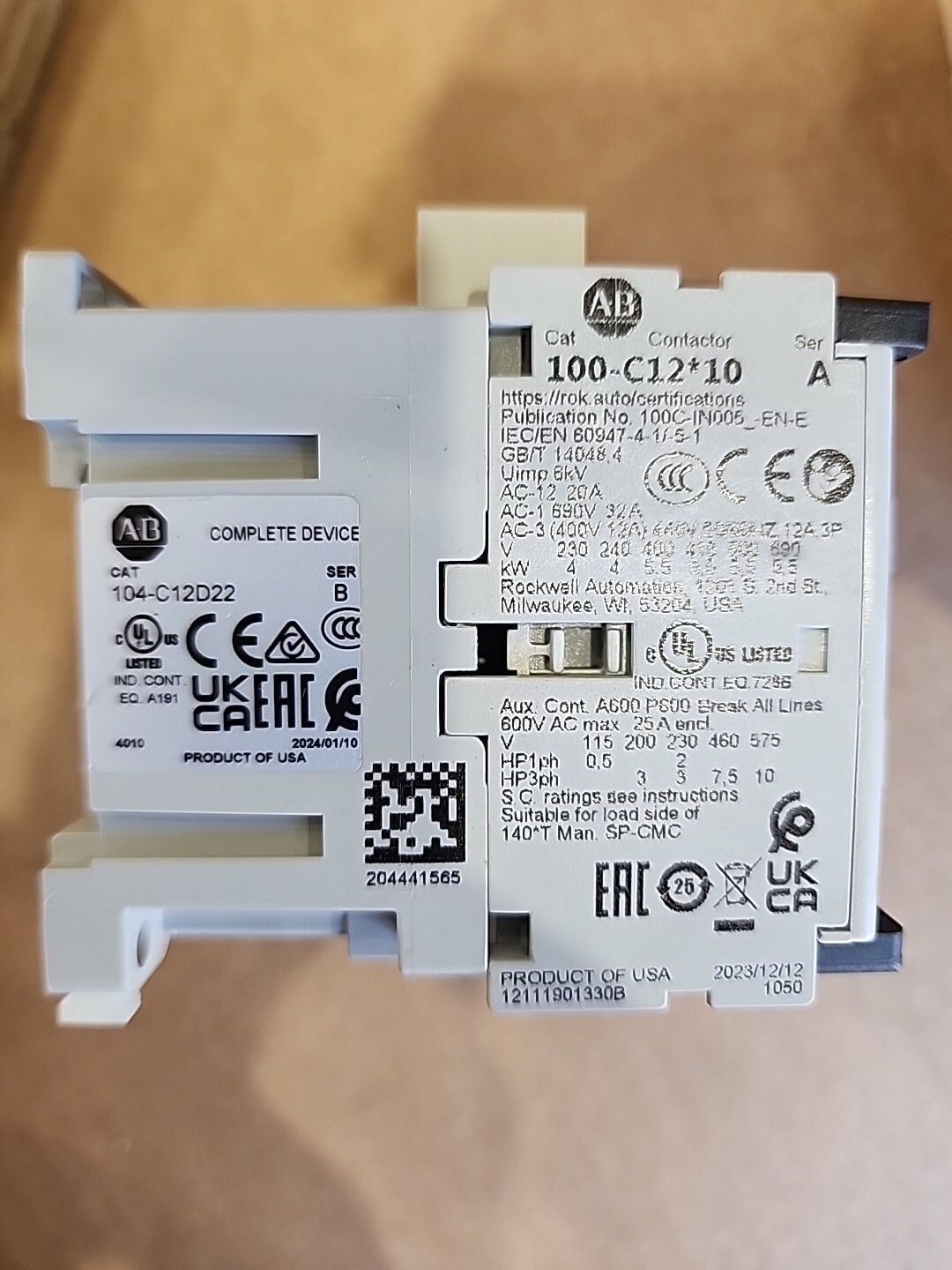 New OEM Allen Bradley Reversing Contactor P/N 104-C12D22