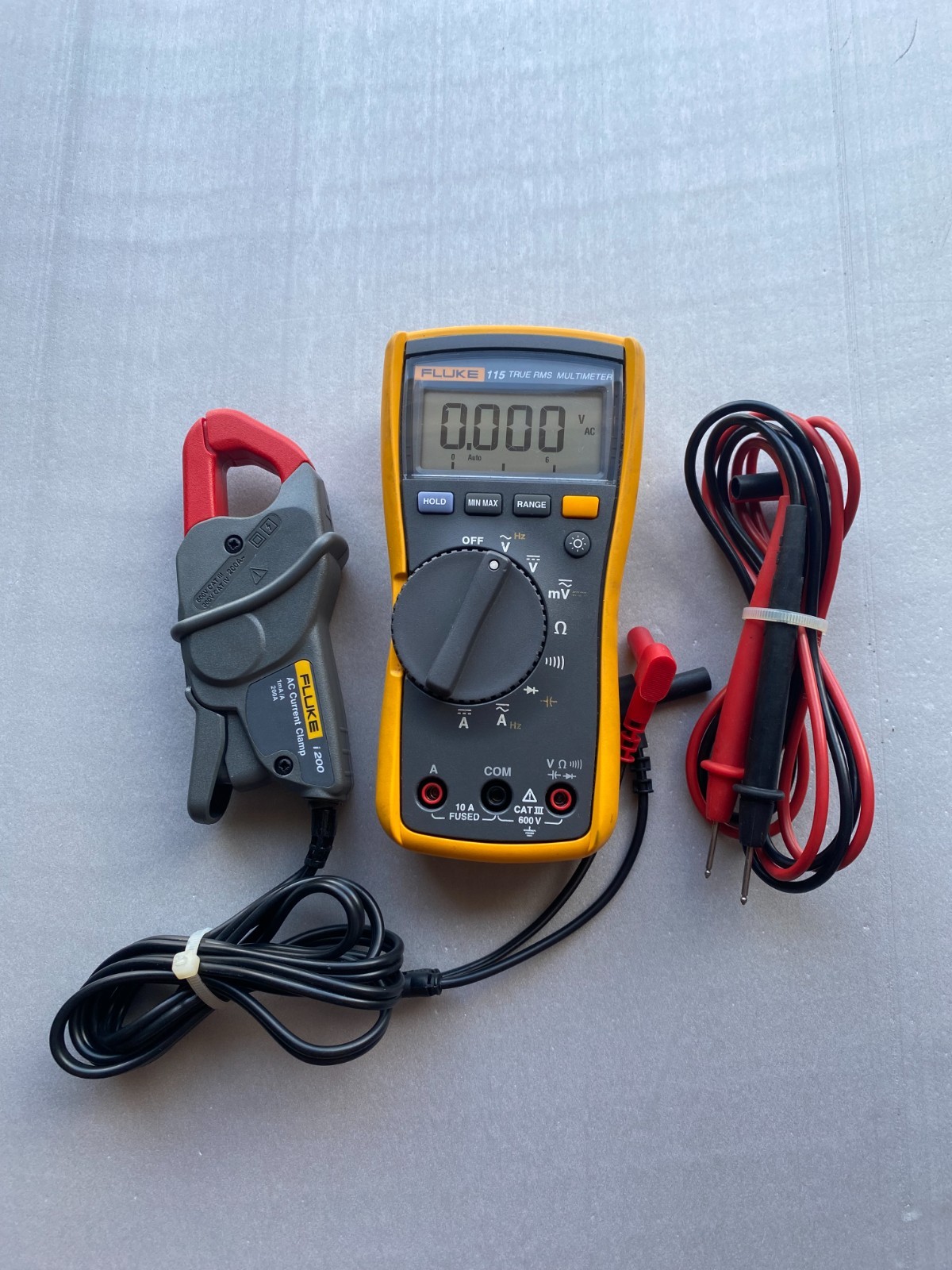 Fluke 115 True RMS Multiple 600V with Fluke i200 AC Current Clamp 1mA/200A