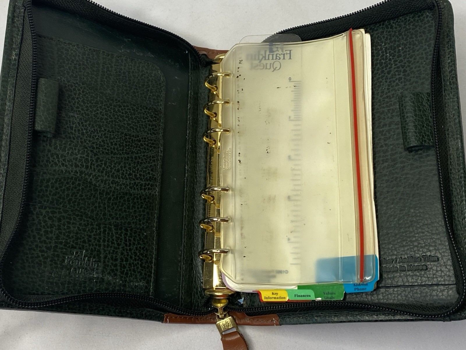 VINTAGE FRANKLIN QUEST ZIP PLANNER LEATHER GREEN/BROWN W/ADJ STRAP 6-1″ RINGS