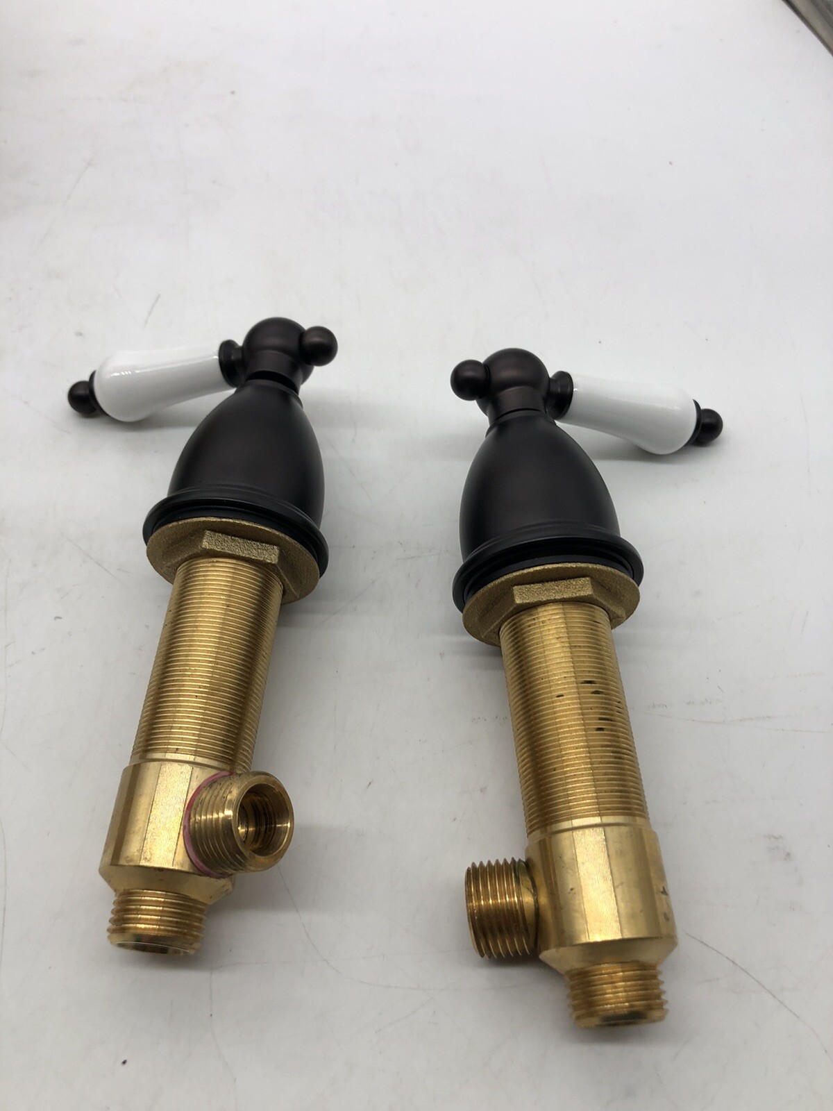 Kingston Brass KB1975PL Heritage Widespread Lavatory Faucet with Porcelain Lever