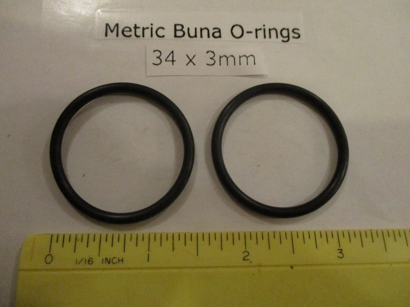 34mm ID x 40mm OD x 3mm thick O-ring. Buna-70. Quan 2.
