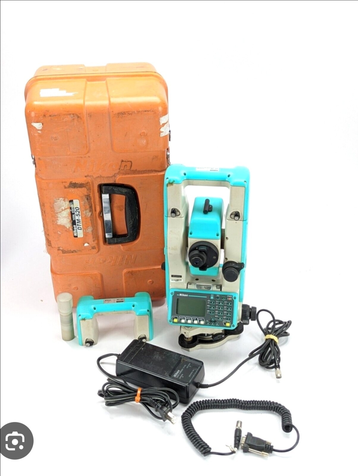 Surveying Instruments: Nikon DTM Total Station, Prisms, Charger, Batteries Case