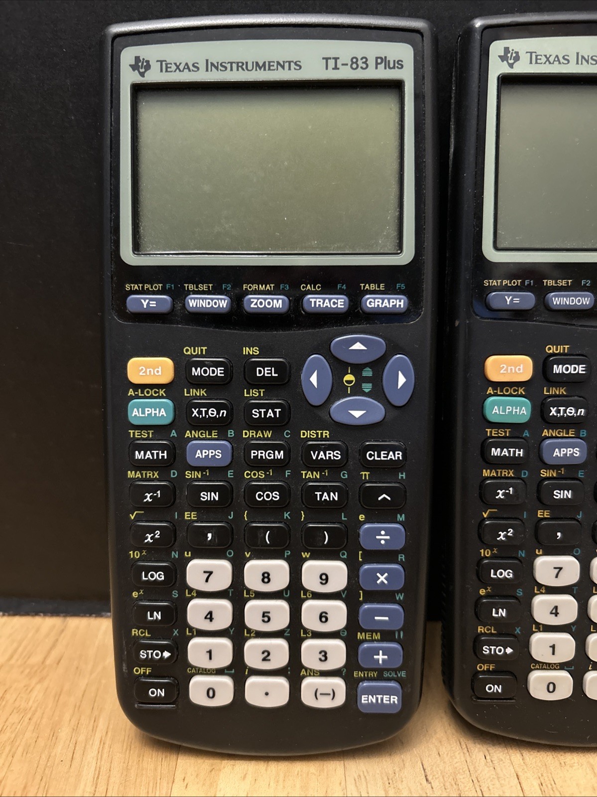 (For Parts) Lot of 2 – Texas Instruments – TI 83 & Plus Calculators