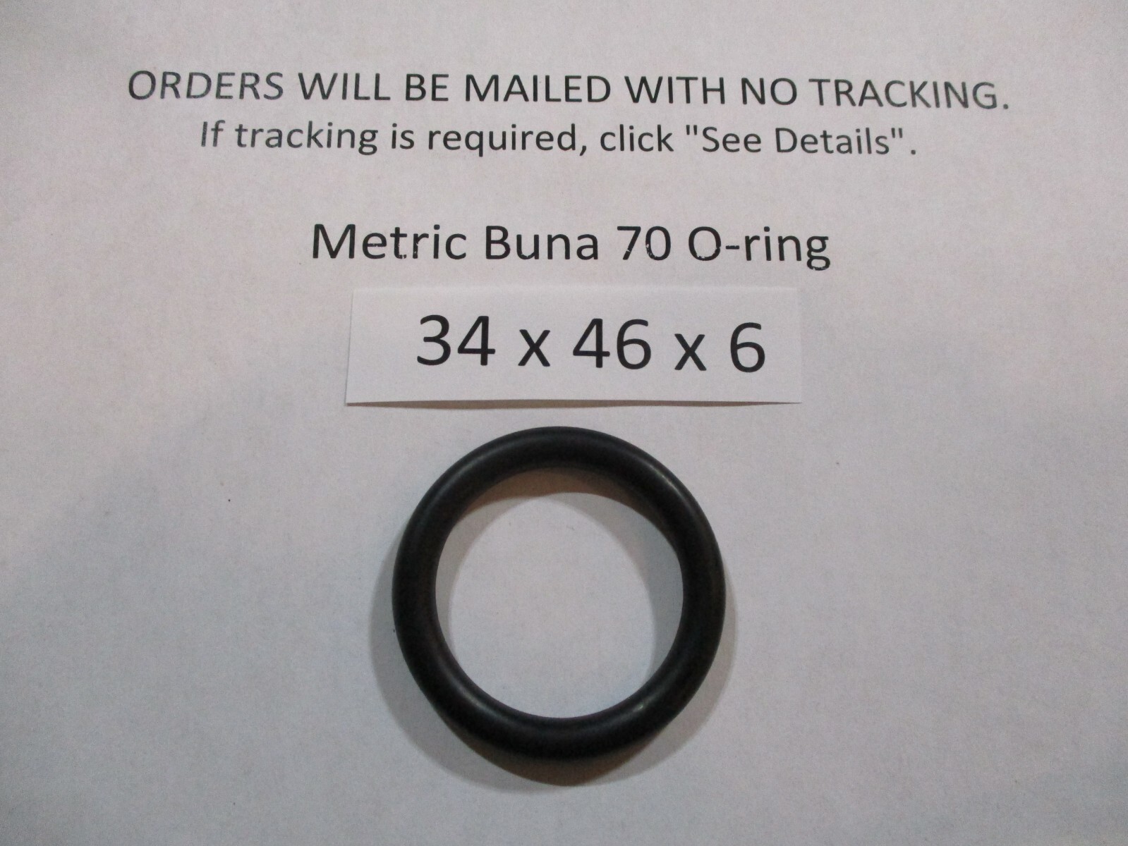 34mm ID x 46mm OD x 6mm thick O-ring. Buna-70. Quan 1.
