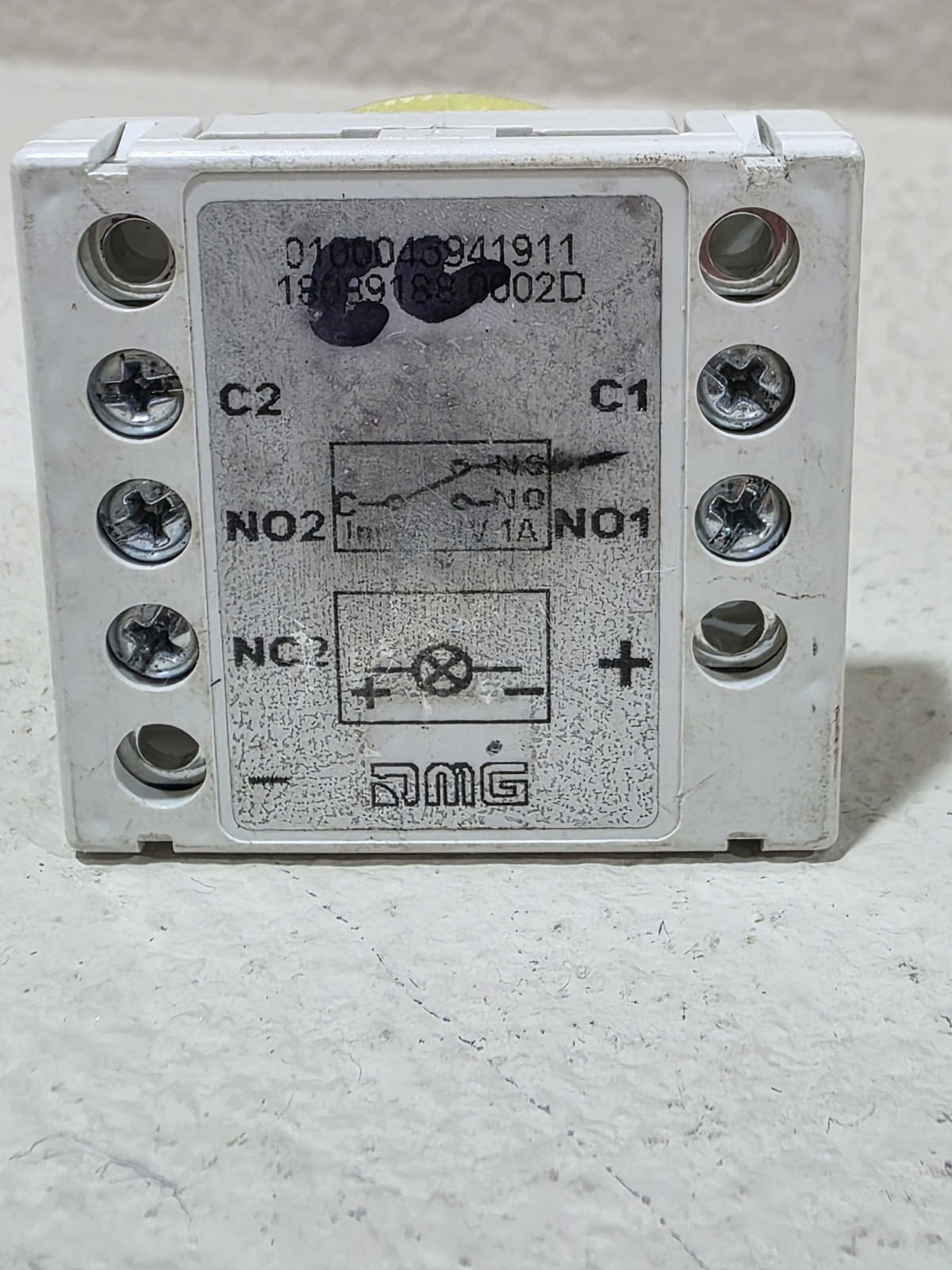 contact block for elevator buttons manufactured by the Italian company DMG