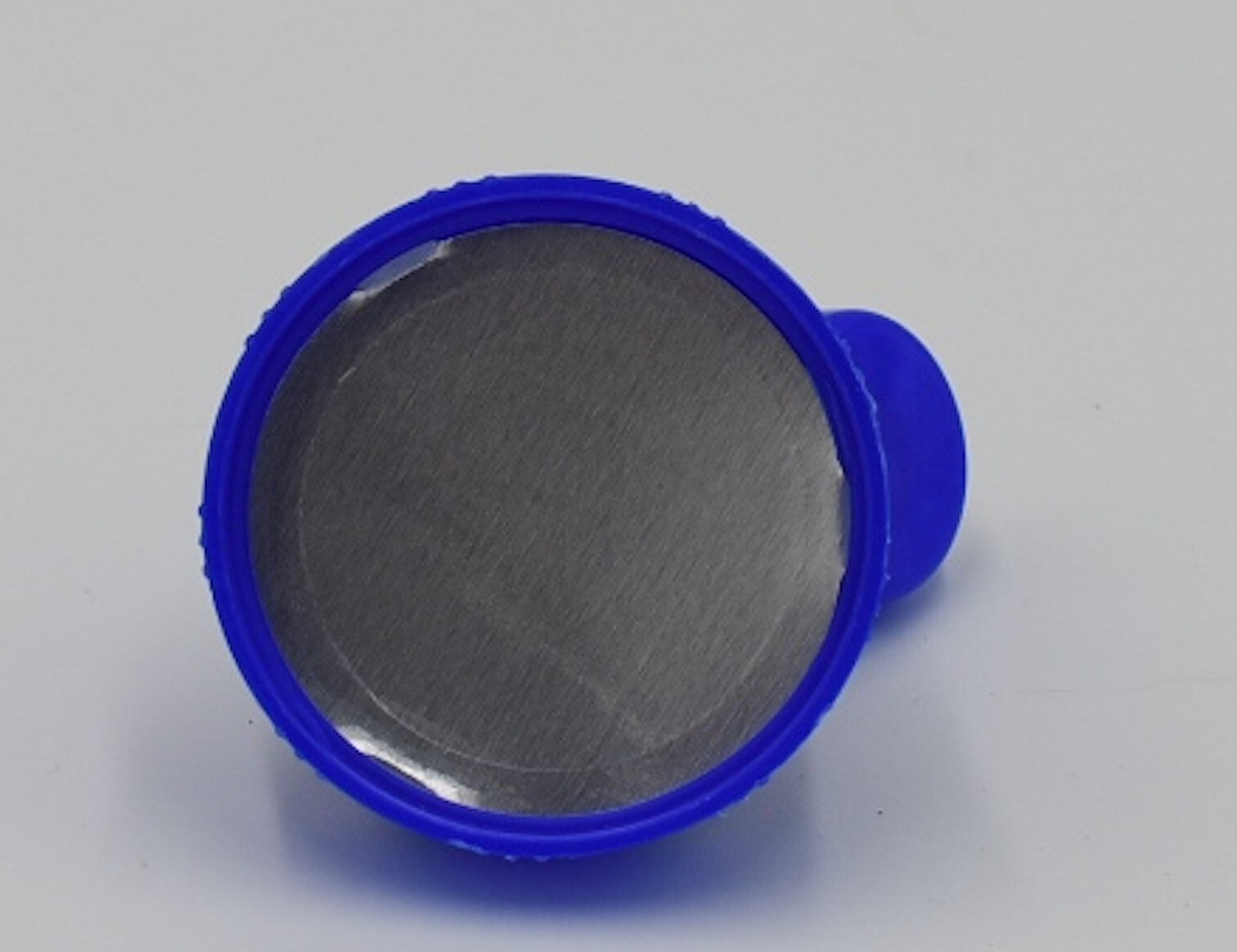 Aptar-38-400 Blue Flip Top Tab Caps with valve. Quantity 1200 per box