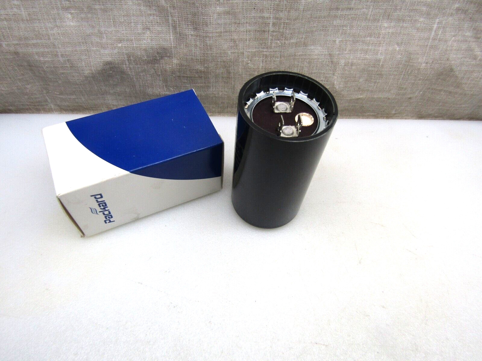 Packard PMJ324A Motor Start Capacitor 324-388 MFD 110-125 VAC 1.8″Dia x 3.38″ L