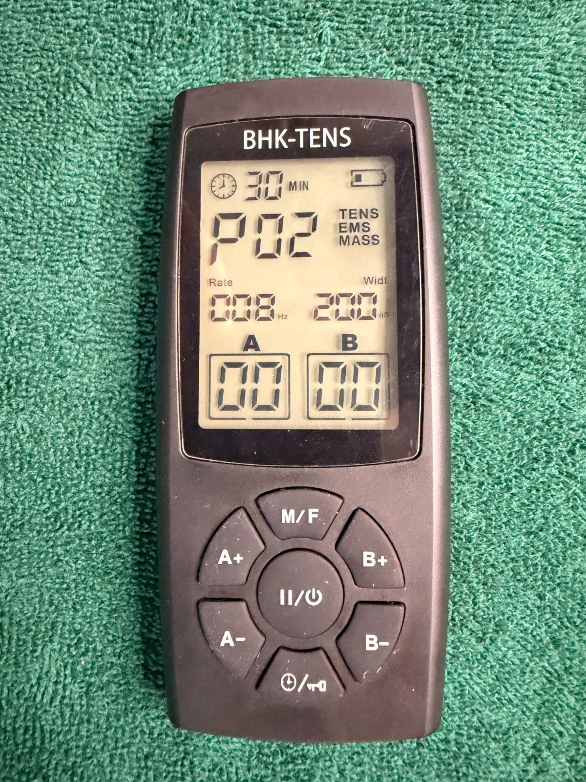 KRES1080 TENS/EMS Unit 2-Channel Handheld Stimulator/26 self adhesive pads