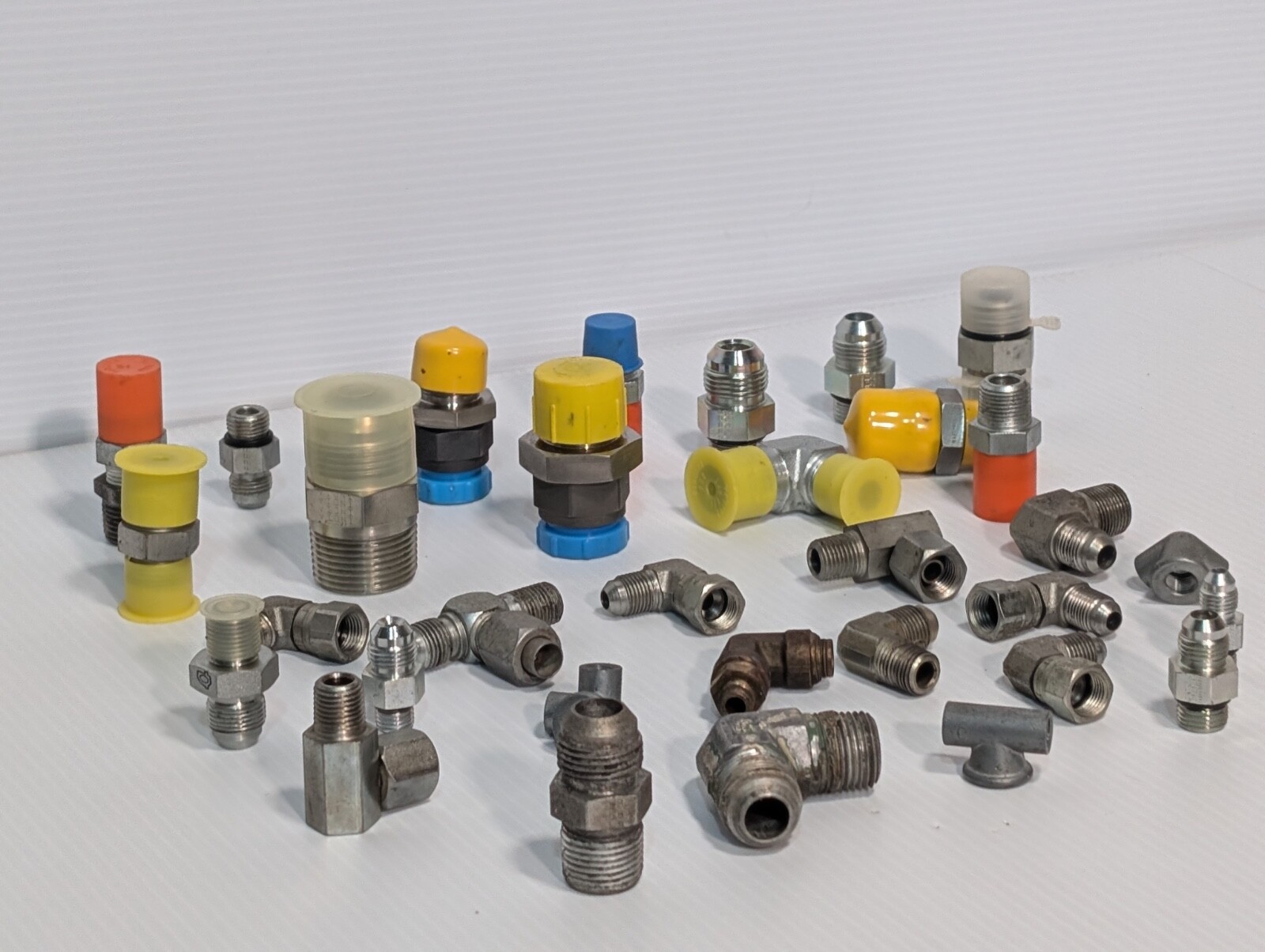 Mixed Lot of Female & Male Swivel Nut Elbow & Industrial Plug Fittings, as shown