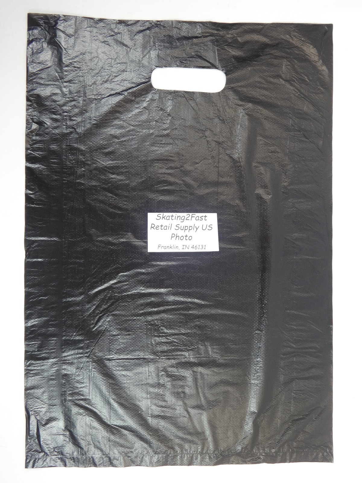500 Qty. 12″ x 3″ x 18″ Black High-Density Plastic Merchandise Bag w / Handle