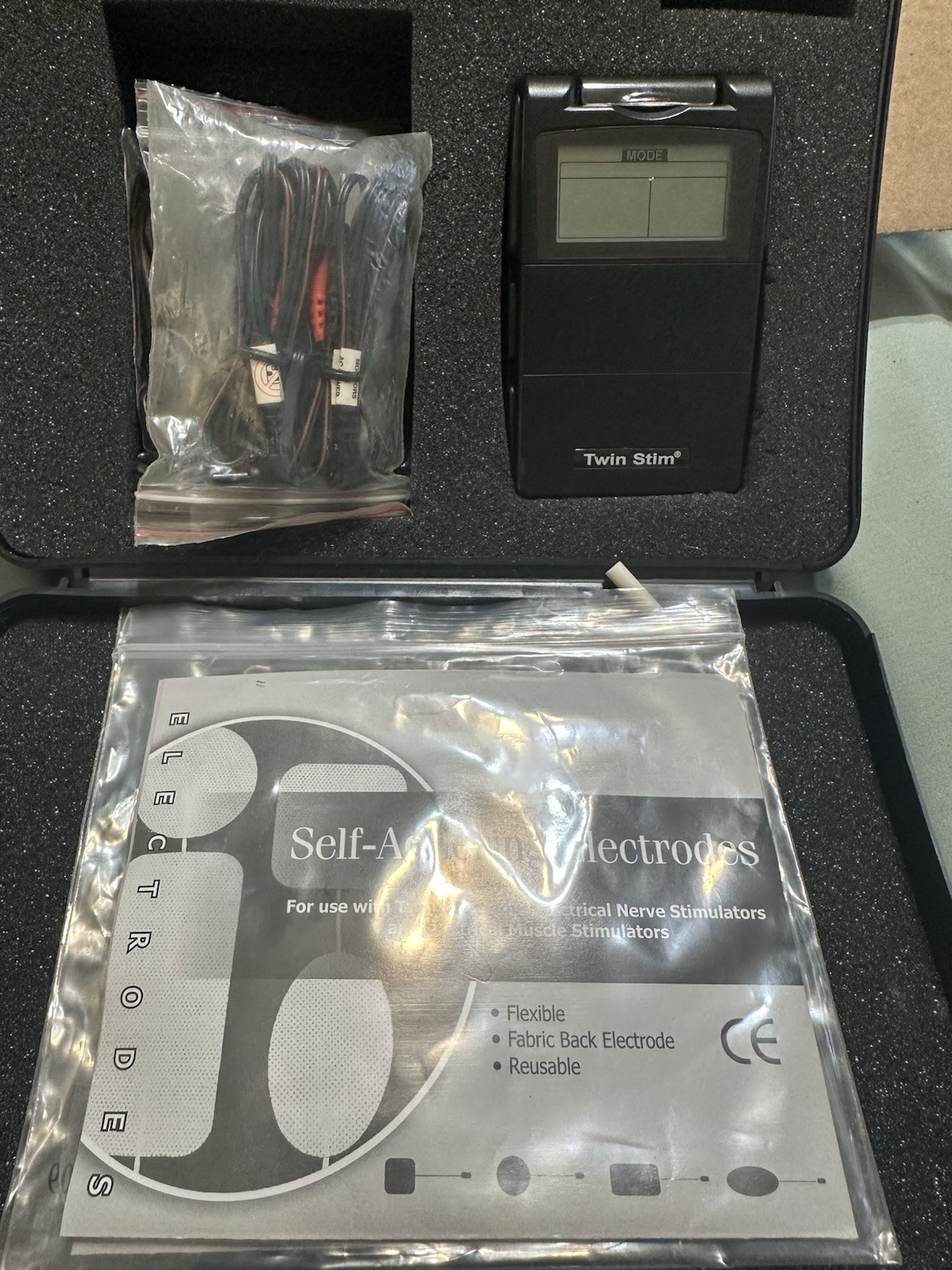 Twin Stim TENS/EMS Unit Handheld with Electrodes and Accessories