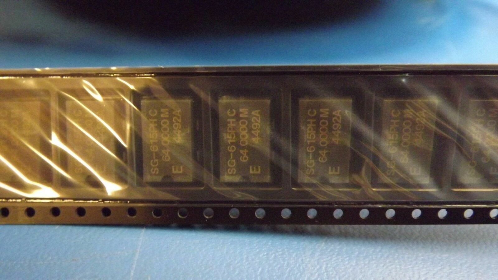 (5PCS) SG-615PH-64.000000MHZ Q33615020002000 CMOS 5V 14X9 100PPM -20/+70