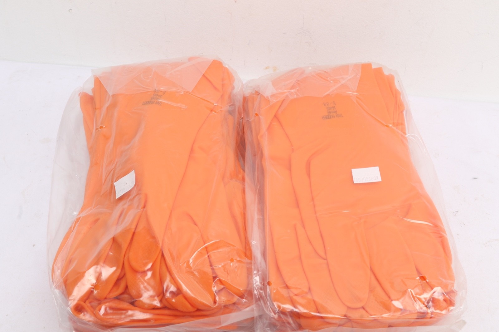 24 Pair of Ansell Gloves Tan Rubber unlined 12″ Length 20mil. Sz. 8, 26-685