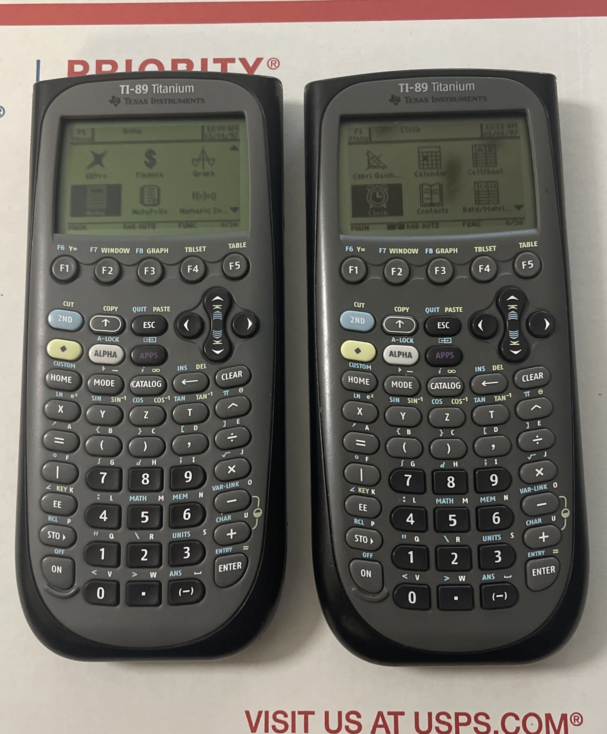 Lot of 2 Texas Instruments TI-89 Titanium Graphing Calculators For Parts/Repair