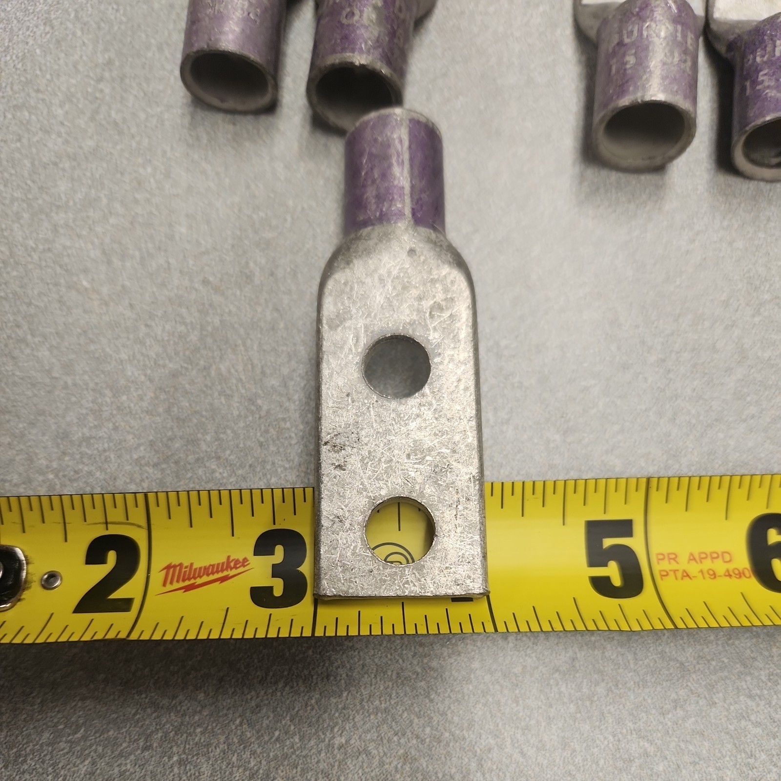 (10) Lug Ends 3/8″ X 1″ spacing 4/0 AWG STR CU Purple Die 15 54