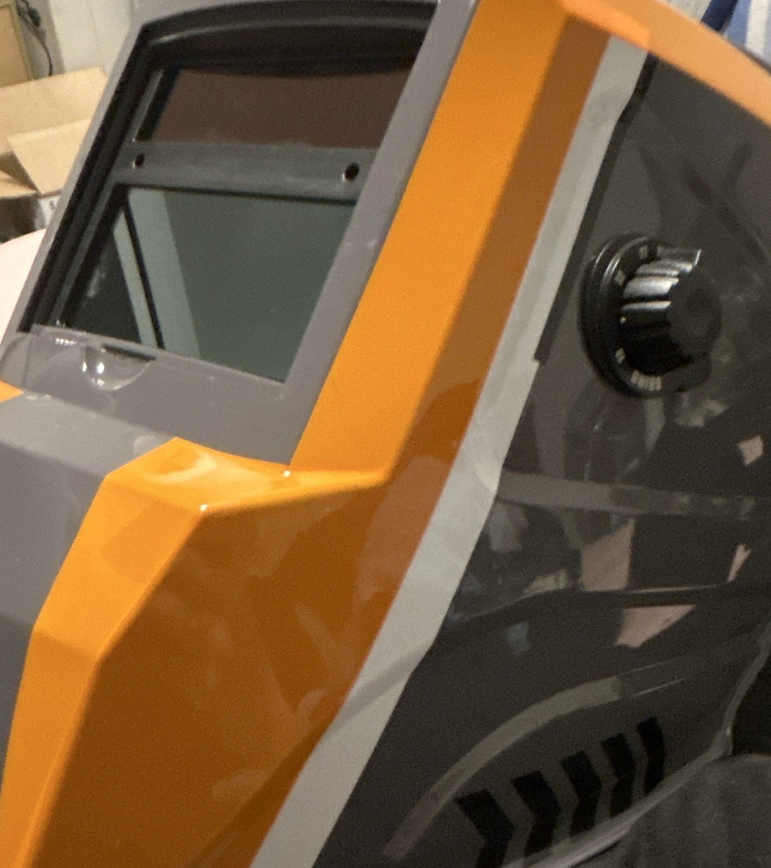RIDGID Auto-Darkening Welding Helmet Gray/Orange Graphics Auto Darkening Filter