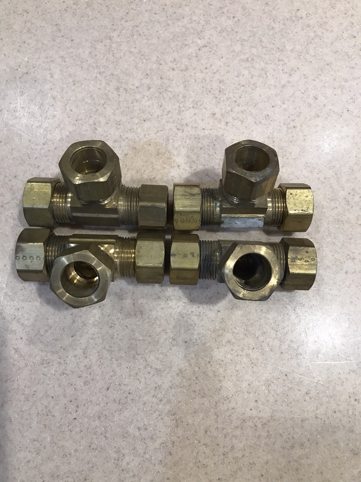 5/8” brass tee compression fittings 3 lots Of 4. new old stock. some tarnish