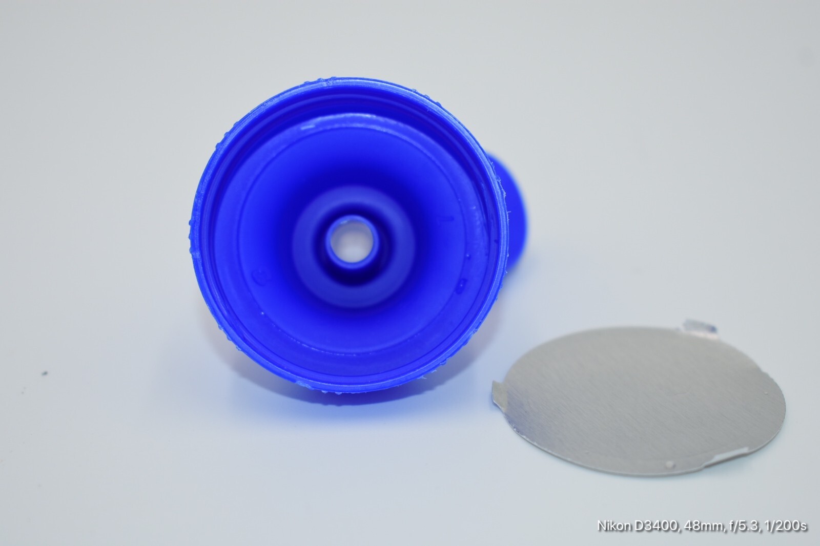 Aptar-38-400 Blue Flip Top Tab Caps with valve. Quantity 1200 per box
