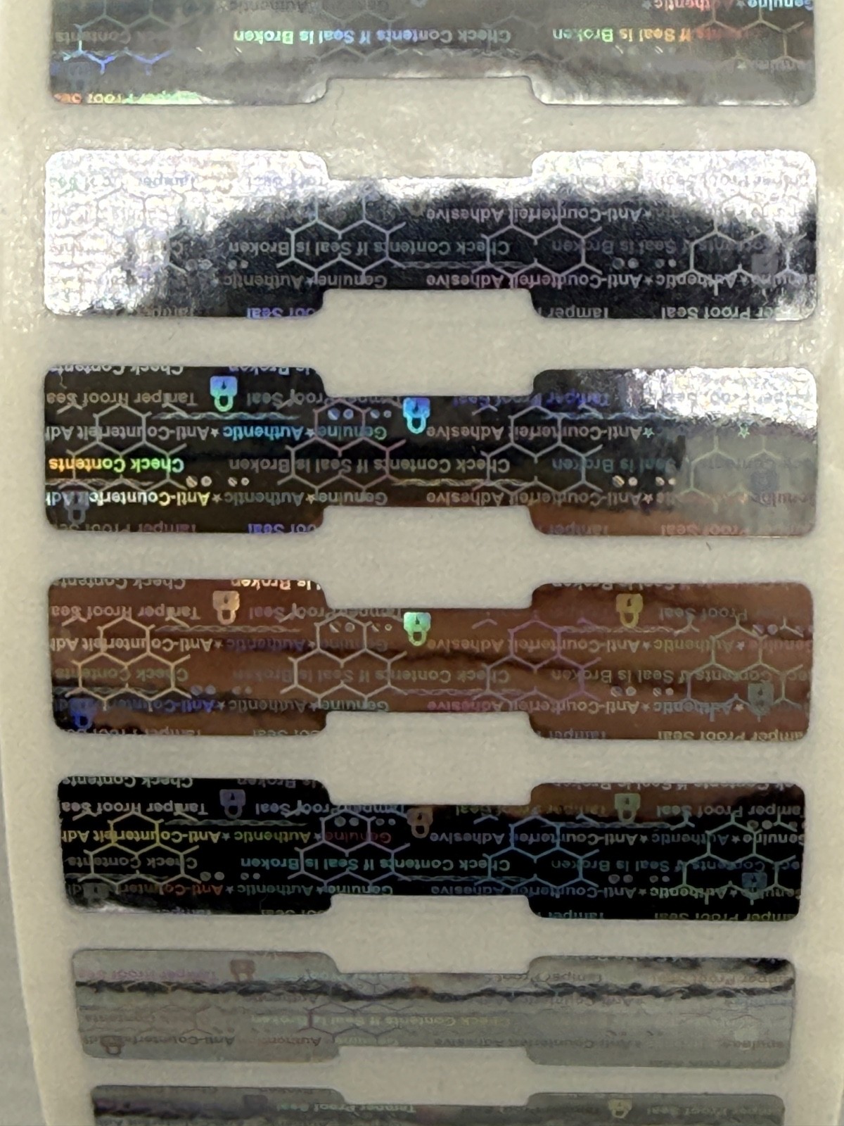 12,500 ROLL-DOGBONE BRIGHT SILVER DOGBONE HOLOGRAM SECURITY VOID LABELS STICKERS