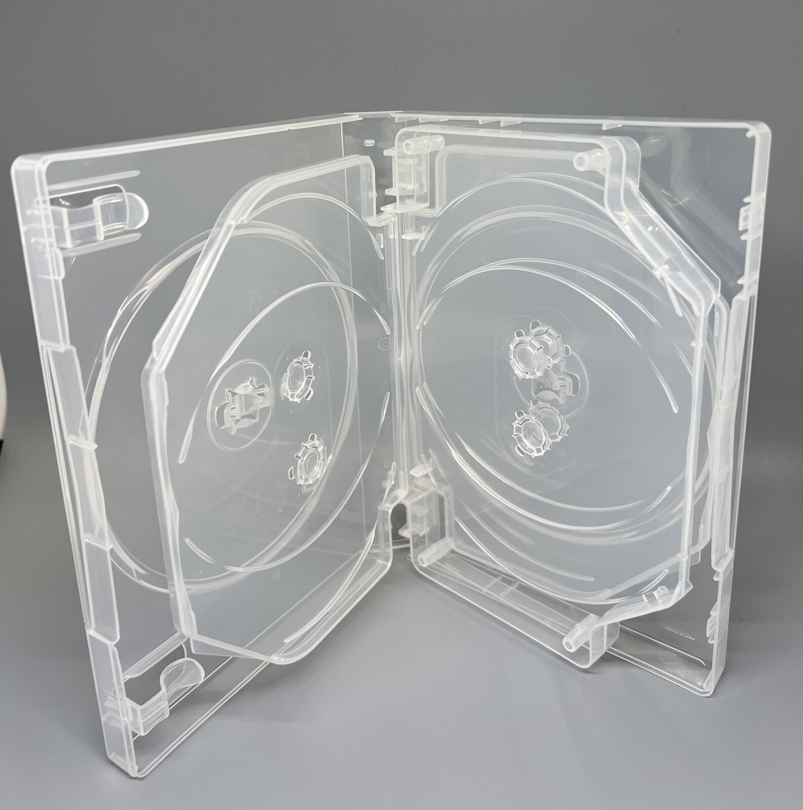 25 PCS NEW HIGH QUALITY 27MM MULTI-8 DISC DVD CASE, M-LOCK HUB, CLEAR, DB27-8C