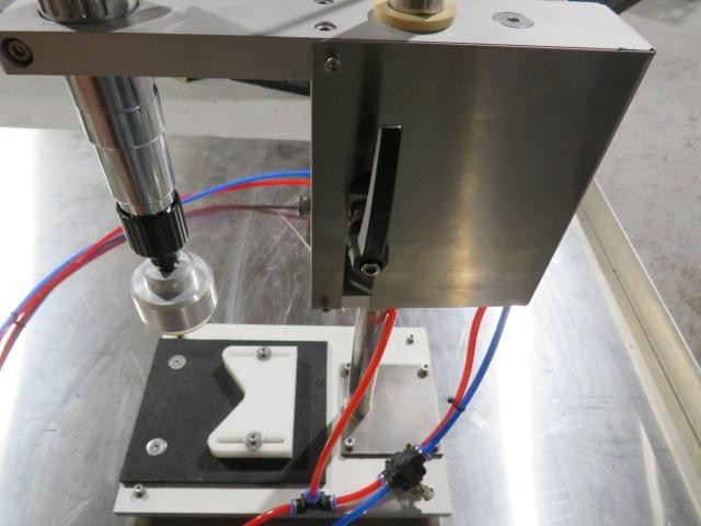 AccuCapper™ BT Semi-Auto Bench Top Chuck Capper automatically tightens screw