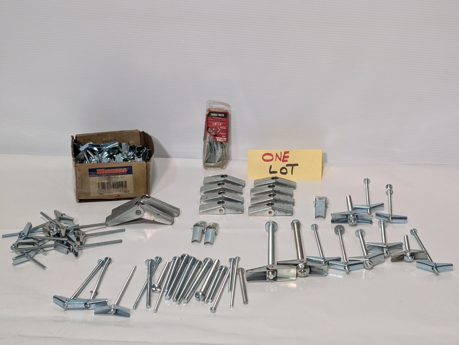 Large Lot of Assorted Sized Hollow Wall Mounting Toggle Bolts Pre-Owned as shown