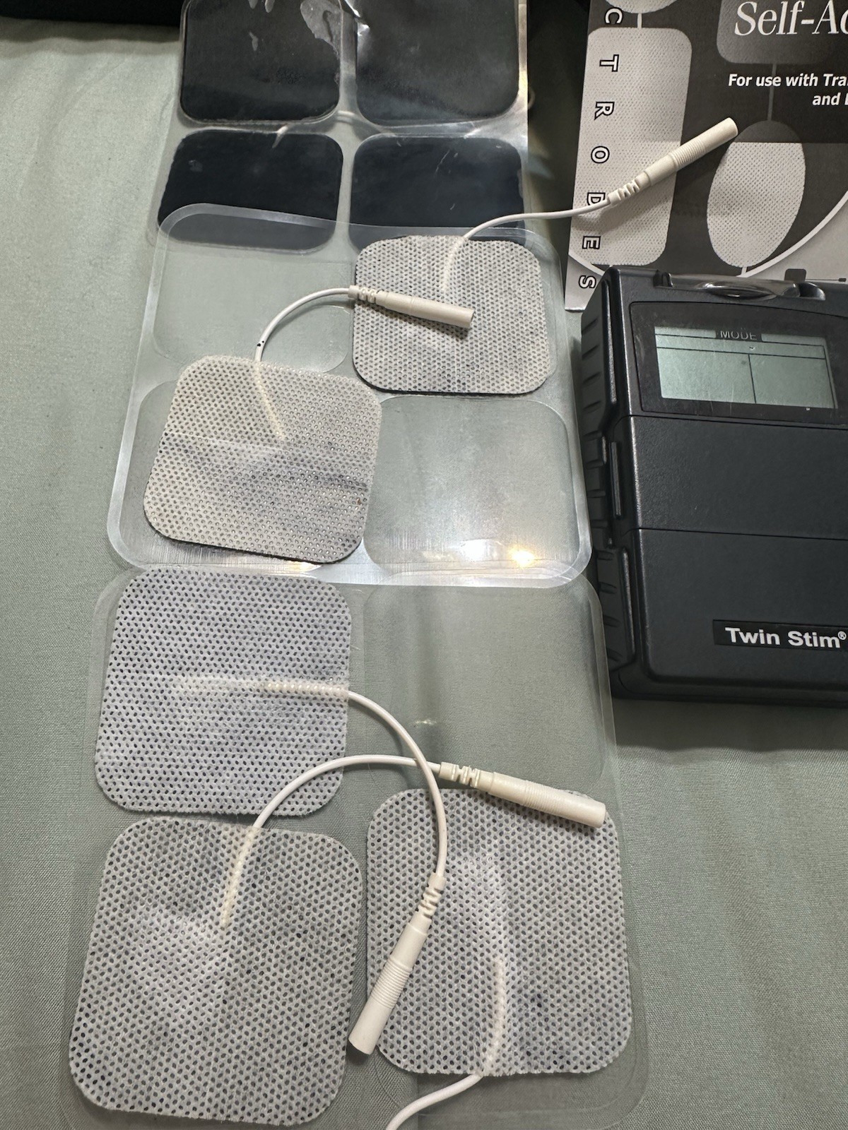 Twin Stim TENS/EMS Unit Handheld with Electrodes and Accessories