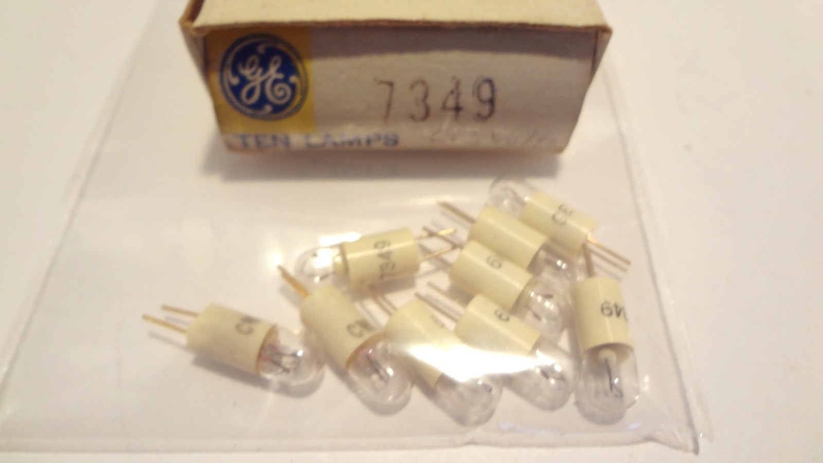 GE LAMPS # 7349 BOX OF (9EA) 6.3VOLT, 1. WATT MINATURE PIN BASE**NEW**