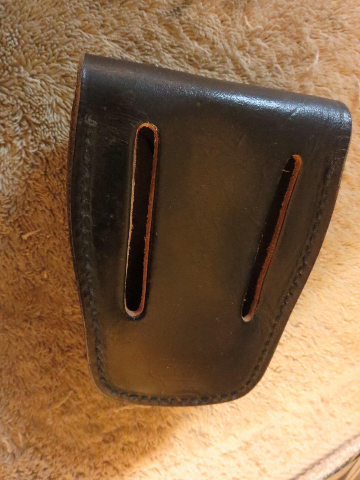 4 handcuff cases: 3 brand names in excellent cond. 1 older, modified, no name.