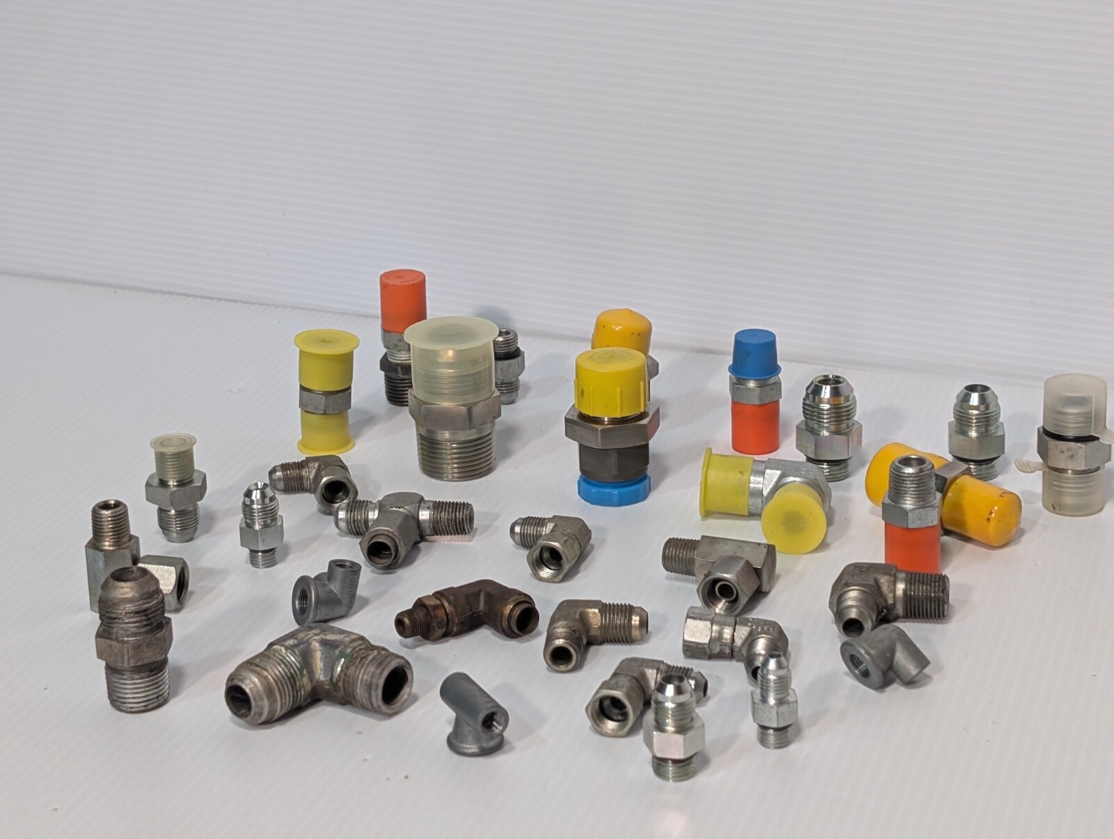 Mixed Lot of Female & Male Swivel Nut Elbow & Industrial Plug Fittings, as shown