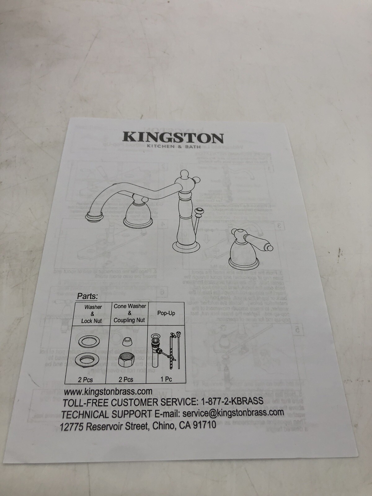 Kingston Brass KB1975PL Heritage Widespread Lavatory Faucet with Porcelain Lever