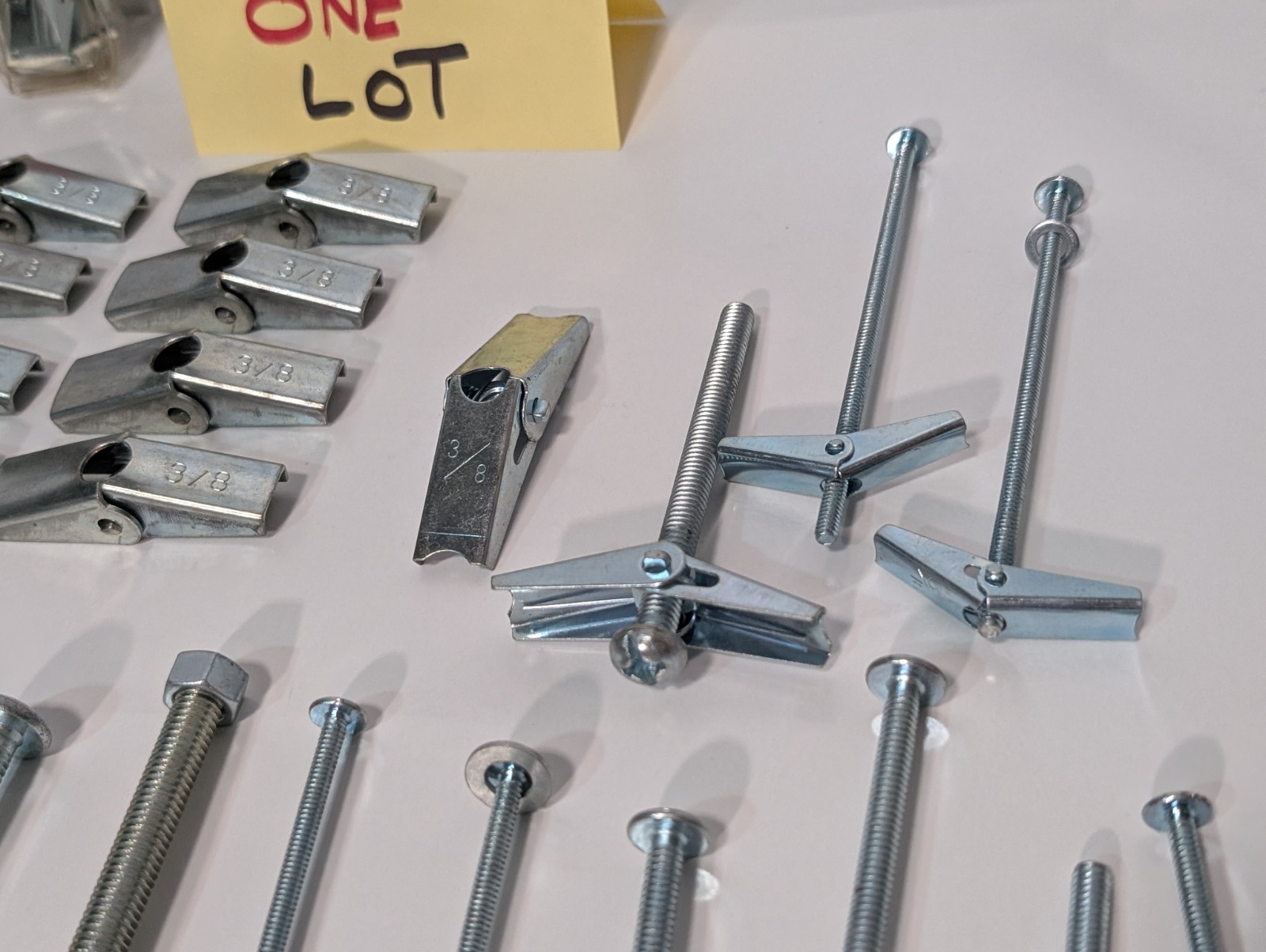 Large Lot of Assorted Sized Hollow Wall Mounting Toggle Bolts Pre-Owned as shown