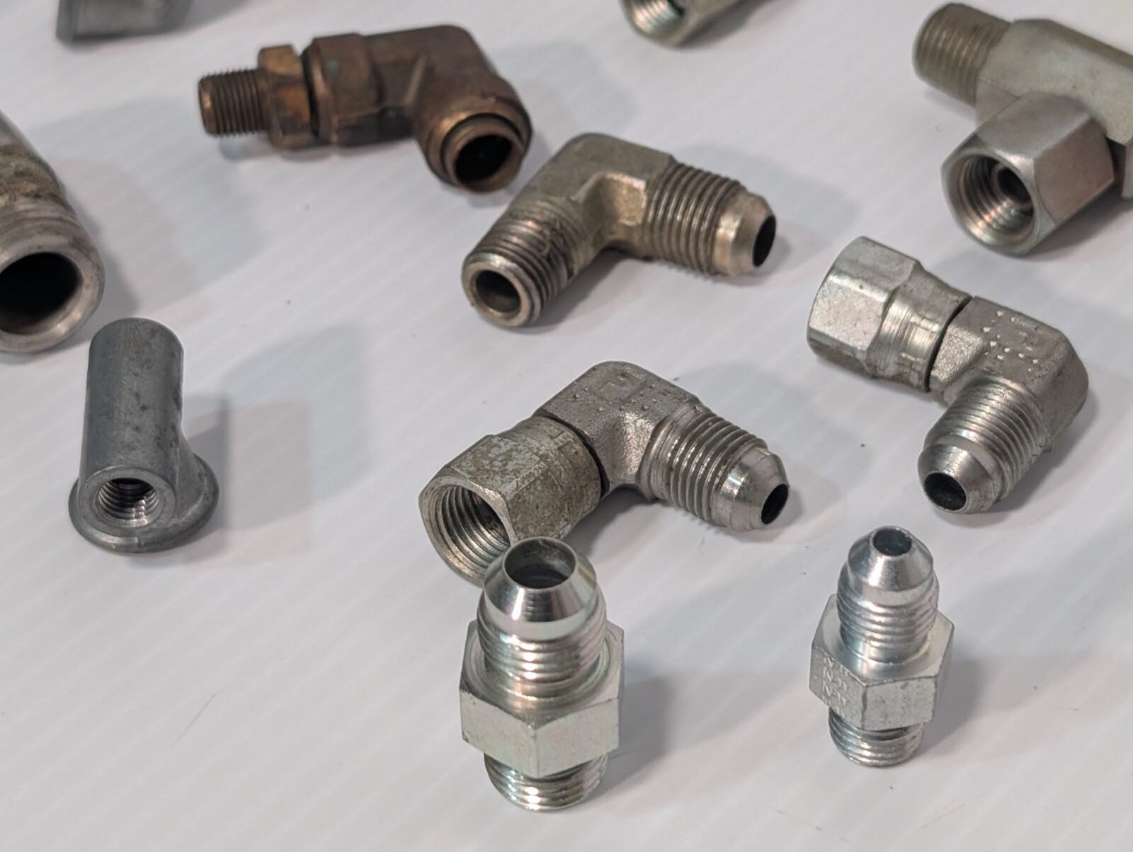 Mixed Lot of Female & Male Swivel Nut Elbow & Industrial Plug Fittings, as shown