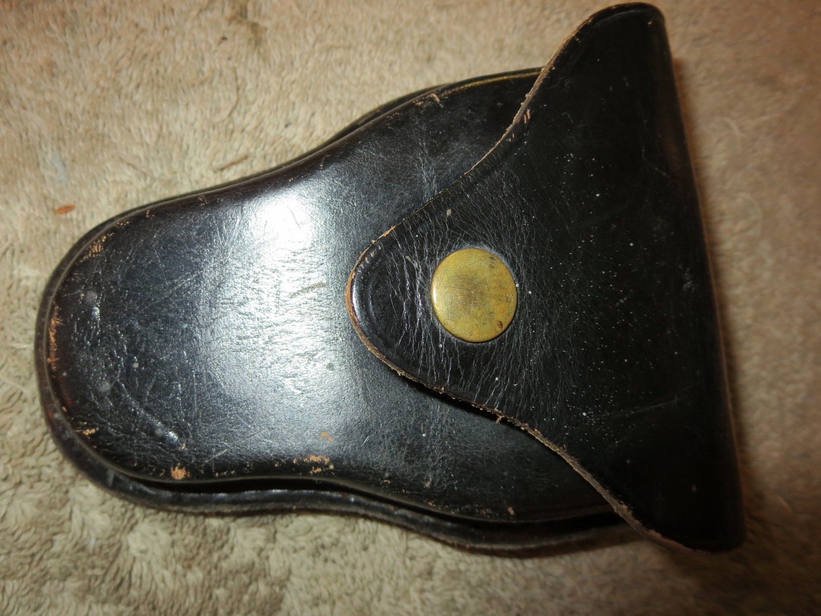 4 handcuff cases: 3 brand names in excellent cond. 1 older, modified, no name.