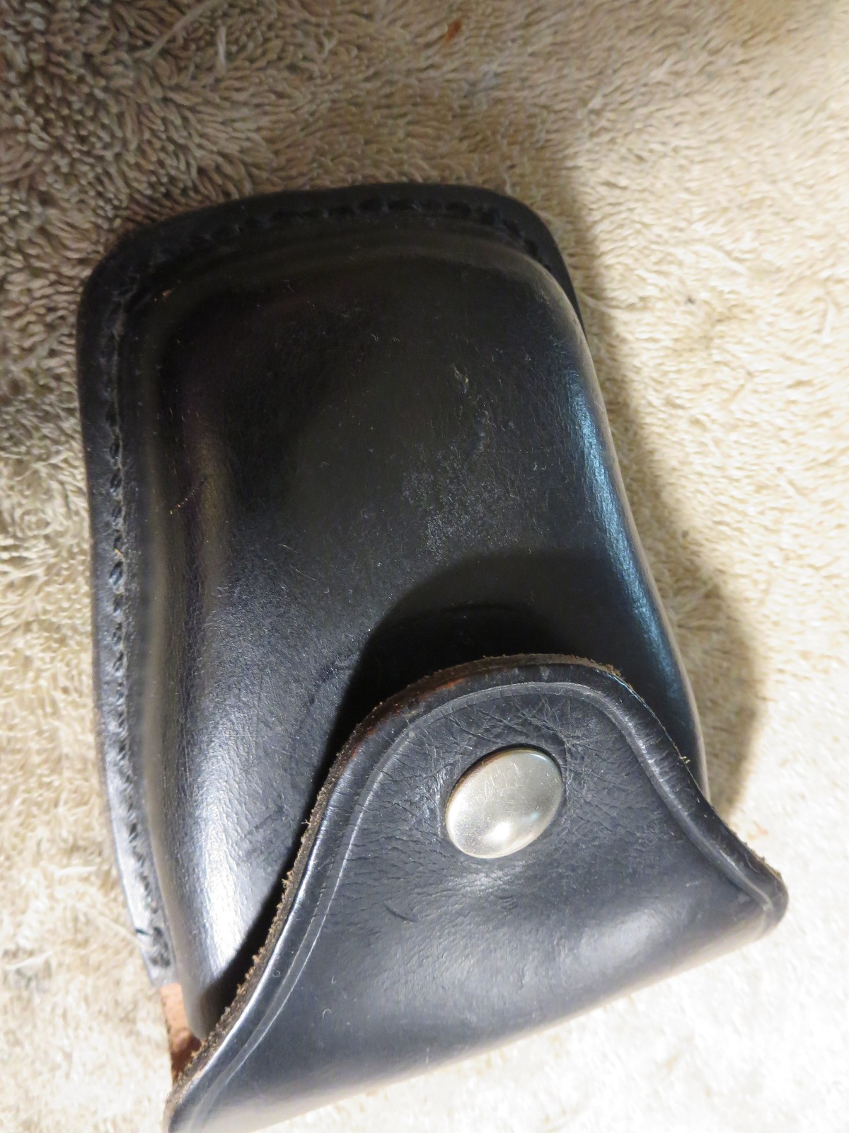 4 handcuff cases: 3 brand names in excellent cond. 1 older, modified, no name.