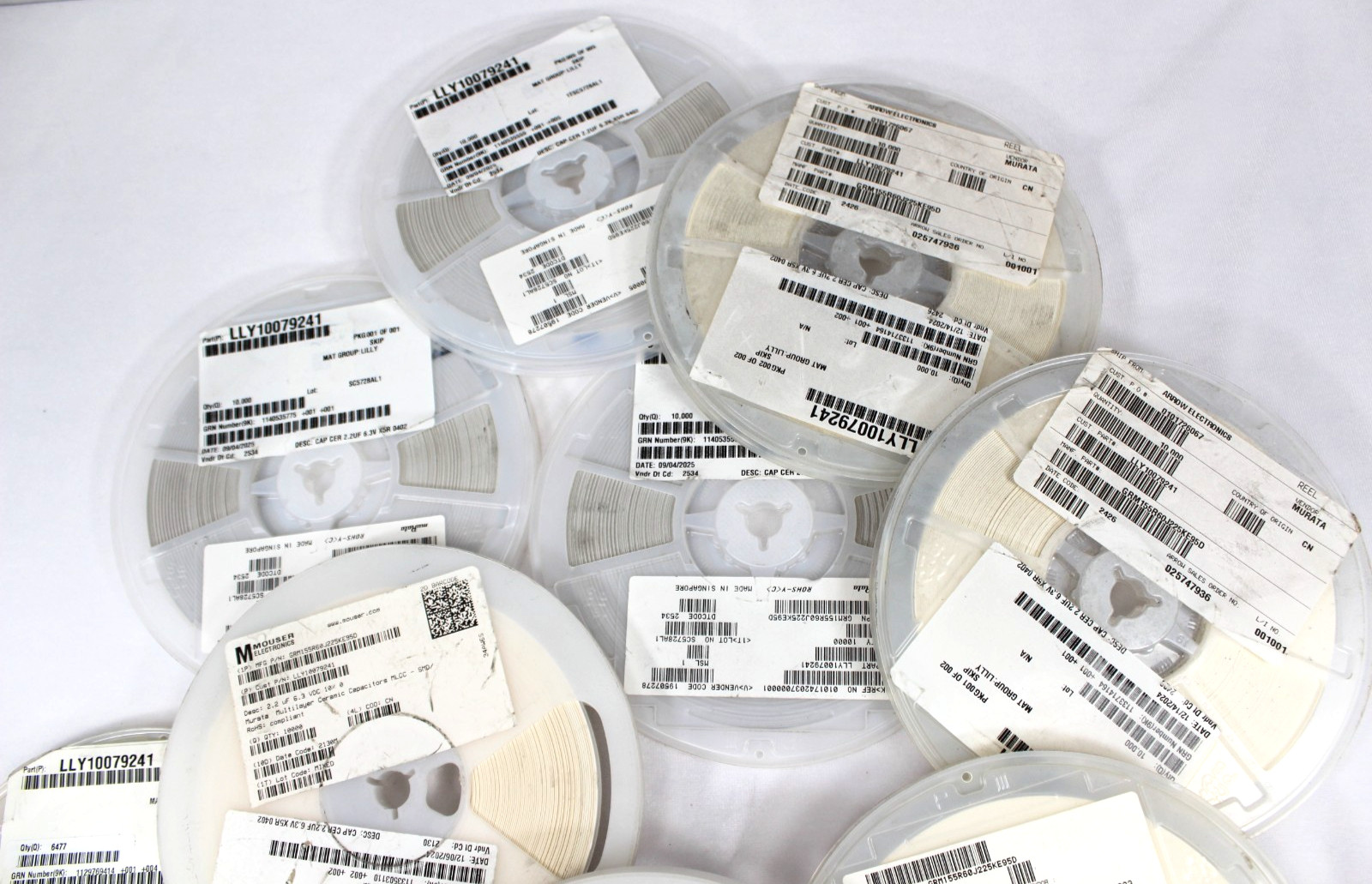 Lot of 9 reels of Murata GRM155R60J225KE95D — 2.2 µF 6.3 V X5R MLCC 0402