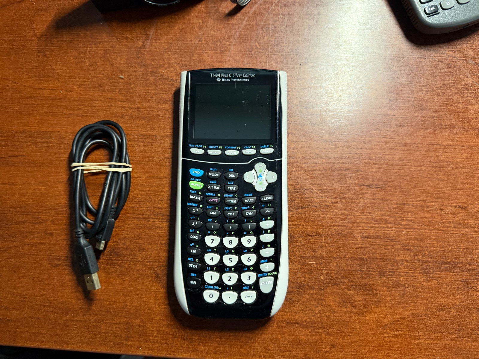 Texas Instruments TI-84 Plus C Silver Edition Graphing Calculator + Cable