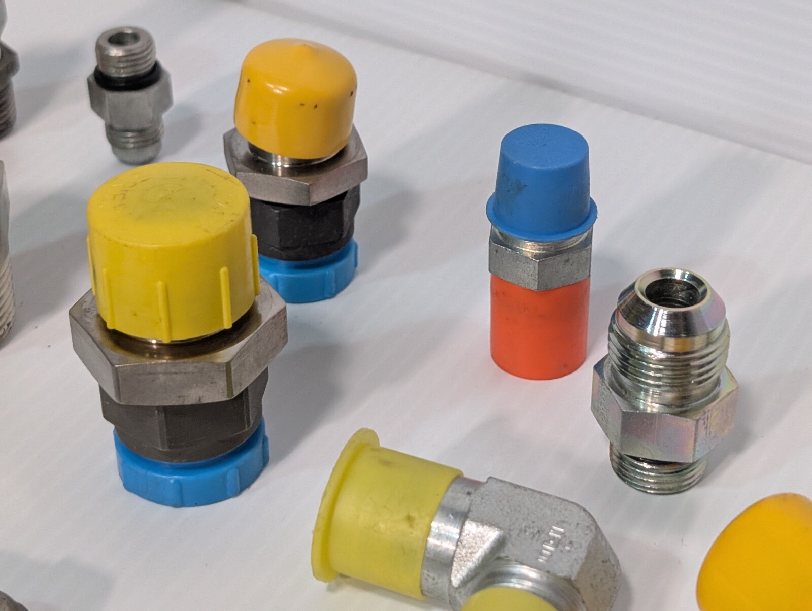 Mixed Lot of Female & Male Swivel Nut Elbow & Industrial Plug Fittings, as shown