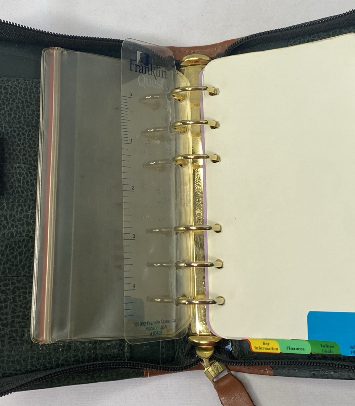 VINTAGE FRANKLIN QUEST ZIP PLANNER LEATHER GREEN/BROWN W/ADJ STRAP 6-1″ RINGS